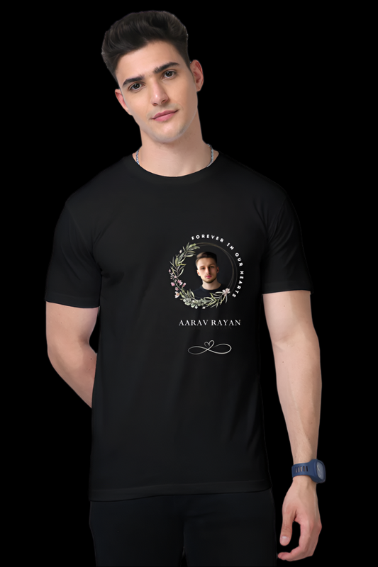 Front design of the ViNK “iN Loving Memory – Forever iN Our Hearts” supima cotton Tee featuring a portrait of a loved one inside a botanical frame, with the inscription “iN Loving Memory Of” above, their name in bold serif below, and the quote “Forever in Our Hearts” anchoring the tribute with a symbolic infinity heart. Available in S upto 5XL.