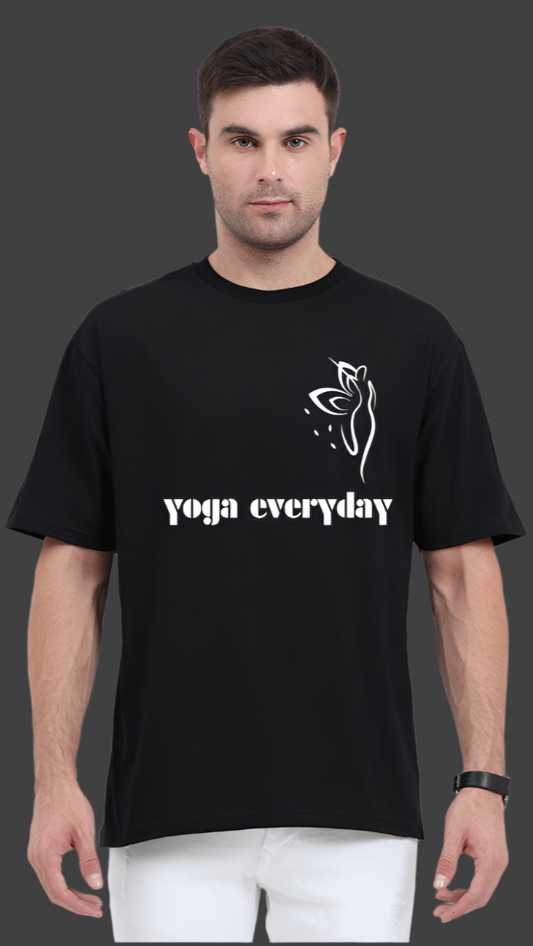 ViNK Wings Oversized Classic Black unisex-yoga-everyday-t-shirt - Model showcasing a front view that features a striking winged yogi in a poised standing pose 